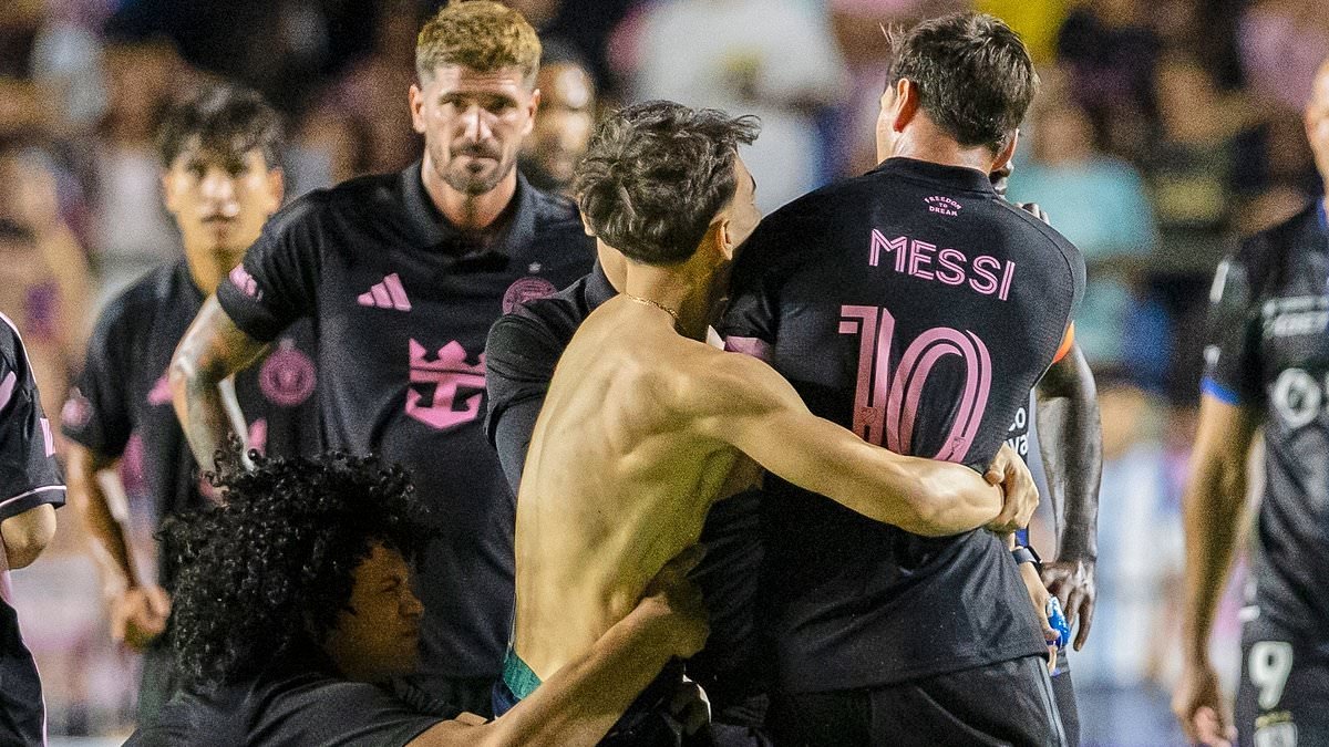 Lionel Messi is hauled to the ground by clumsy security guard after crazed fan storms pitch and grabs Inter Miami superstar in shocking incident