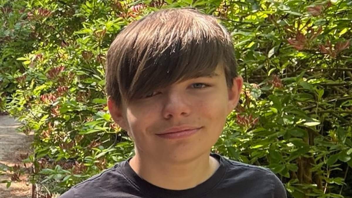 Two schoolboys died when both were hit by a train as one tried to save friend who was threatening to kill himself, inquest hears