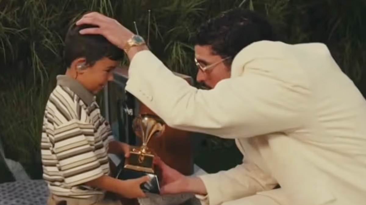 Bad Bunny hands Grammy to young boy at Super Bowl halftime... and fans are convinced it was a dig at ICE