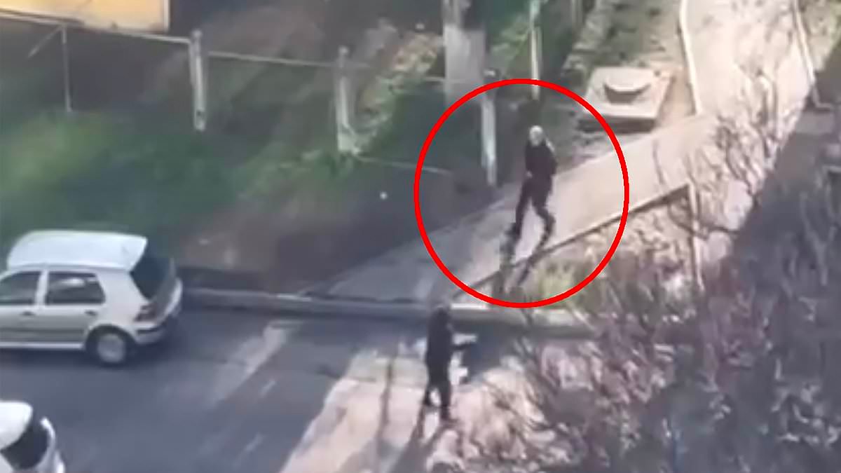 Gunman kills 'several' as he opens fire in Kyiv street before being surrounded by special forces as he takes hostage in supermarket