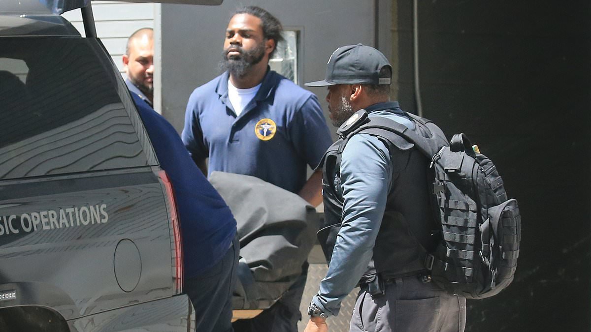 Epstein jail guards used 'fake body' to trick media waiting outside the prison while paedophile's real corpse was loaded into van 'unnoticed', files claim