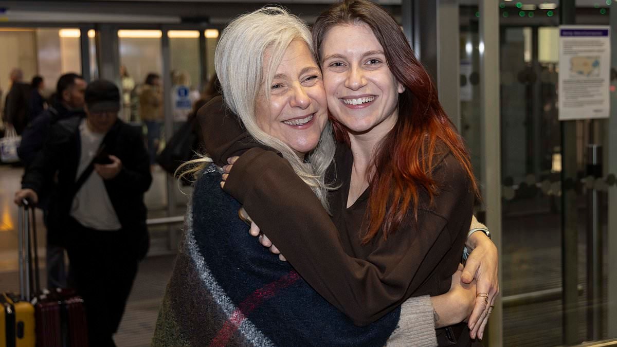First evacuation flight from the Middle East touches down in the UK: Relieved Brits hug loved ones after landing at Heathrow - and tell of 'terrifying' recent days