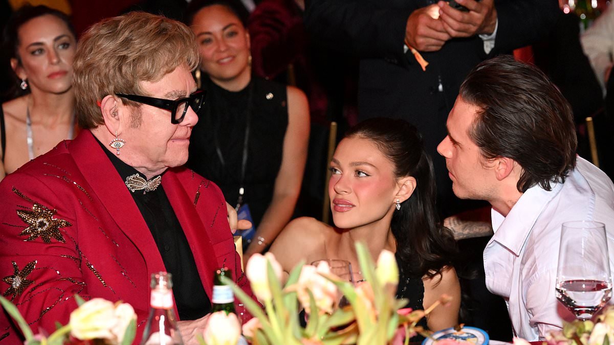 Elton John hosts godson Brooklyn Beckham and Nicola Peltz at his Oscars viewing party... after hot sauce influencer's Mother's Day Swipe at Victoria