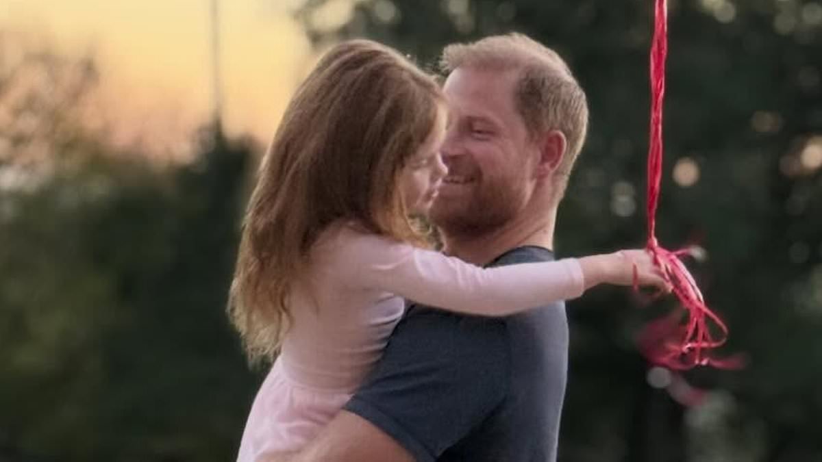 Meghan shares photo of beaming Harry carrying Lilibet in his arms as she gushes they and Archie are her 'forever Valentines'