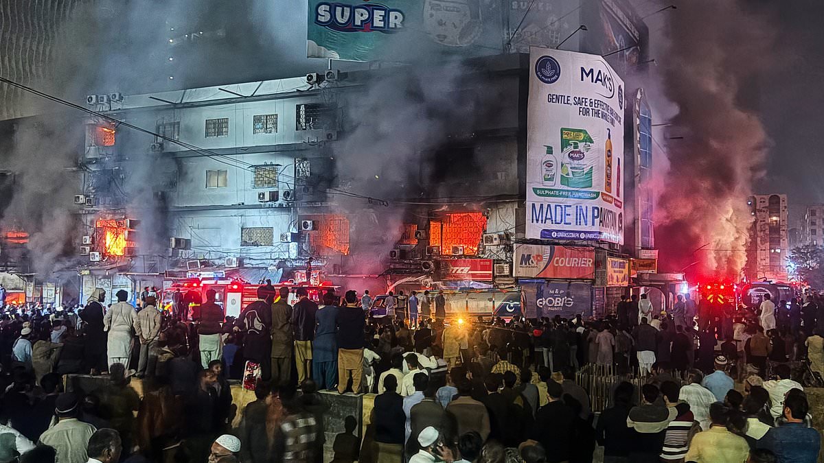 Firefighter and five civilians killed as huge fire sweeps through shopping mall in Karachi