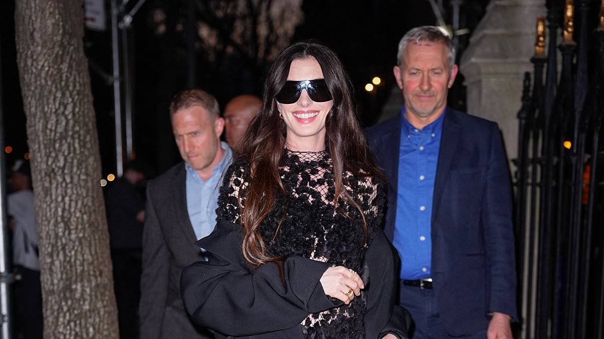 Anne Hathaway unveils an uncharacteristically daring new look as she flashes her underwear in a racy see-through dress