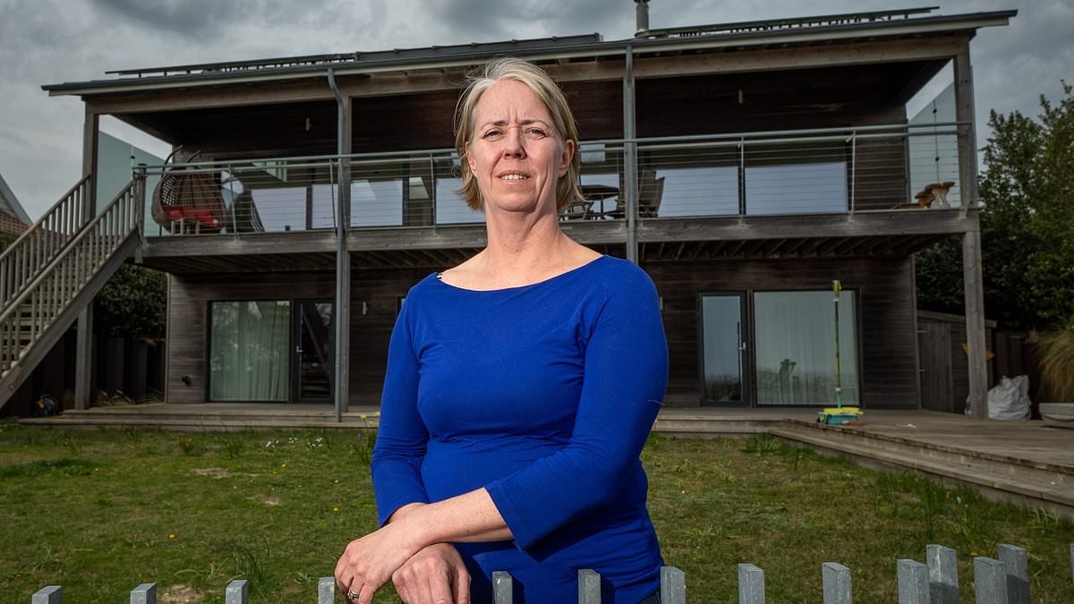 I've been forced to demolish my dream clifftop home - despite raising £250K for sea defences: Villager's house will be lost to the waves as new rock wall AVOIDS her house