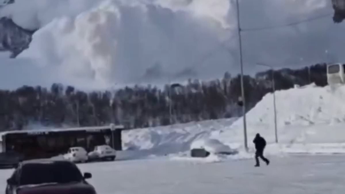 Terrifying moment enormous avalanche engulfs ski resort at Europe's tallest mountain before sweeping over tourists as they ran for their lives