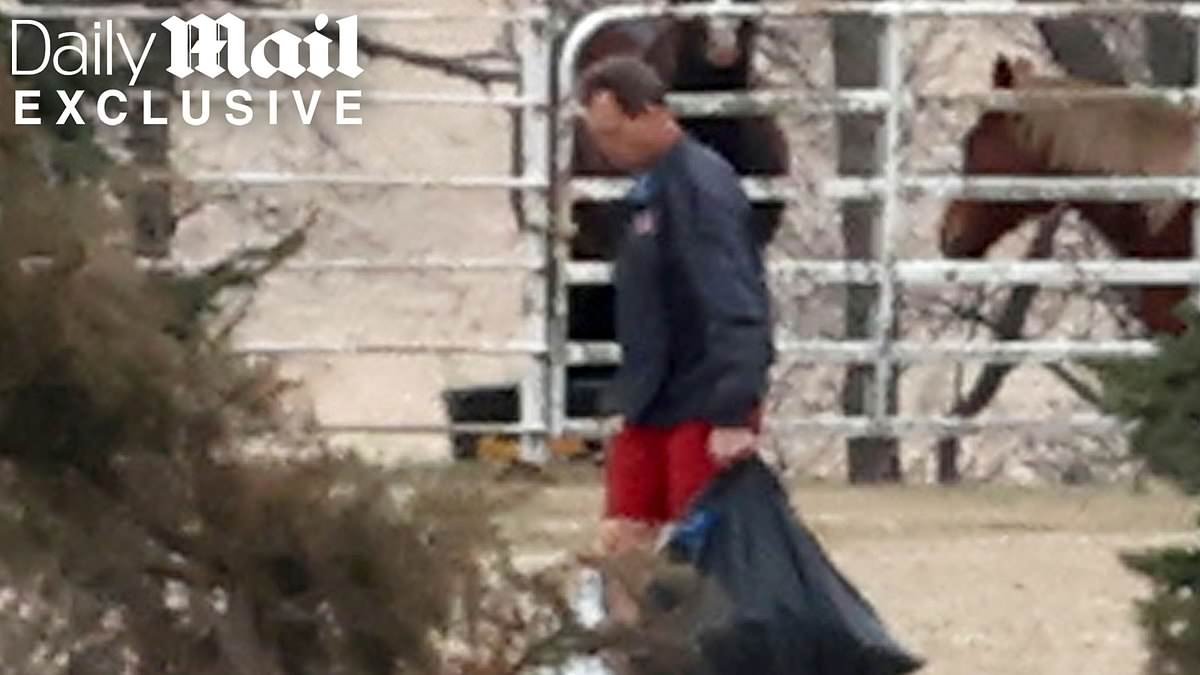 Kristi Noem's husband Bryon keeps his head down as he's seen for the first time at family ranch since 'bimbofication' scandal bombshell