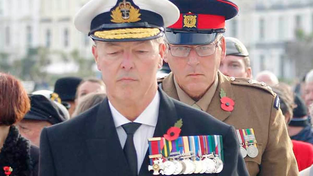 'Fake admiral' admits illegally wearing military uniform after gatecrashing Remembrance Sunday event with chest full of 'suspicious' medals