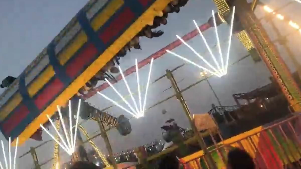 Terrifying moment carnival ride detaches and crashes to the ground at Indian fair, injuring 13
