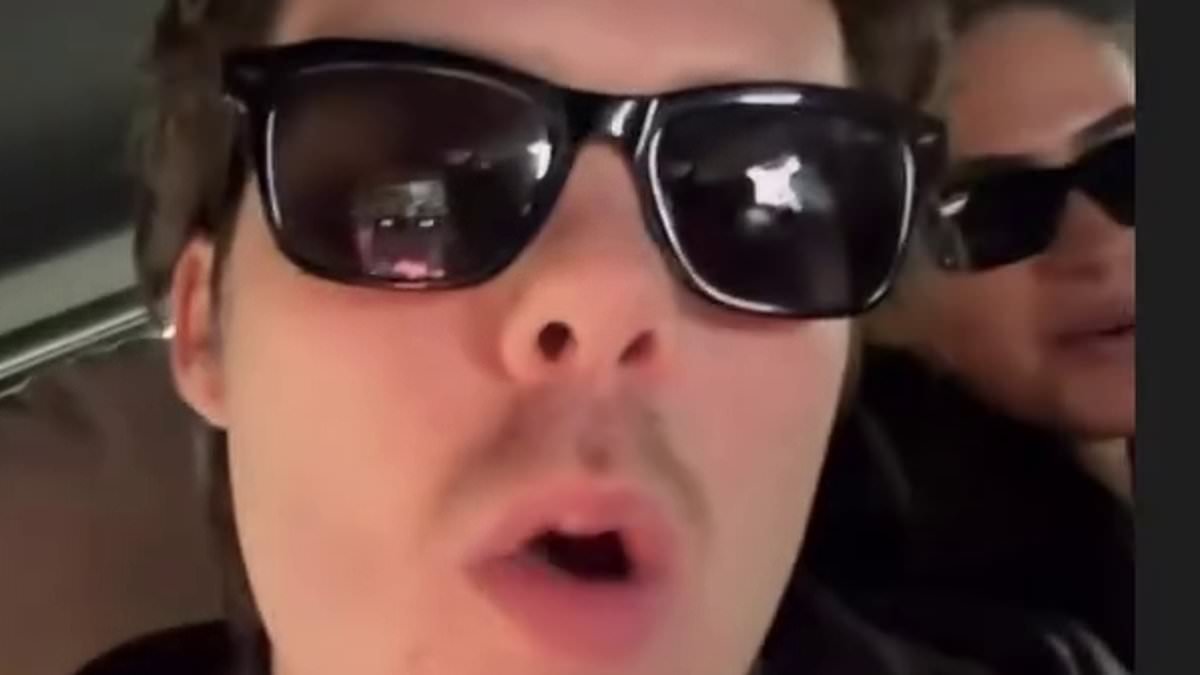 Cruz and Romeo Beckham appear to take a bold swipe at 'hater' Brooklyn in playful video as they buddy up in Paris... after estranged brother's explosive statement