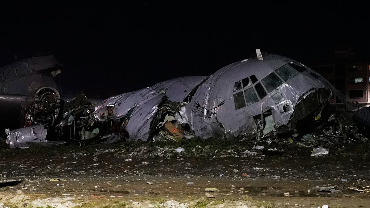 At least 15 dead after military plane carrying wads of cash crashes on busy street in Bolivia
