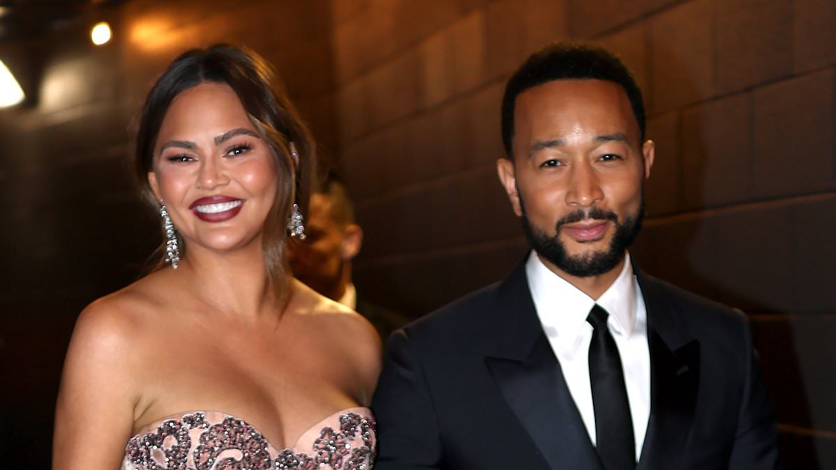 Chrissy Teigen dazzles in glittering gown with daring thigh-high slit as she enjoys date night with husband John Legend at the Grammys after revealing she's gone sober again