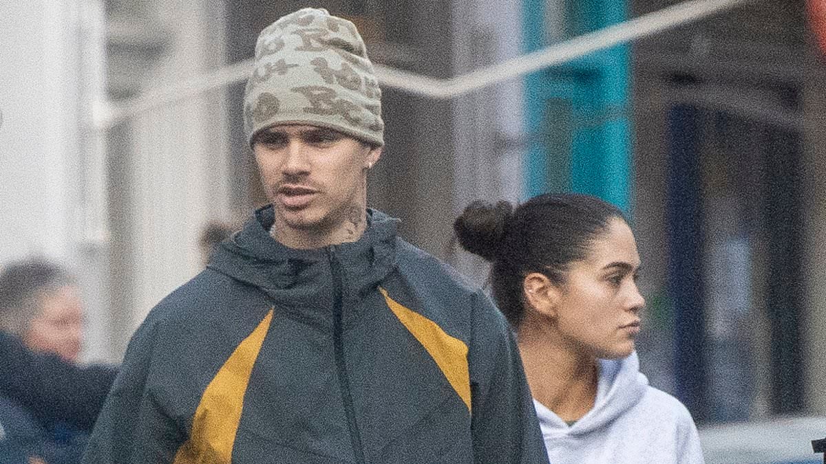 Stoney-faced Romeo Beckham breaks cover with Brooklyn's 'ex' Kim Turnbull - after older brother claimed Victoria has repeatedly invited other women into his life to make him uncomfortable'
