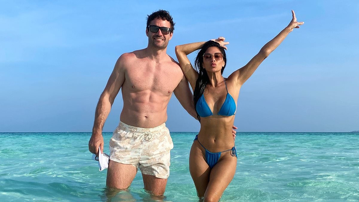Nicole Scherzinger, 47, looks incredible in blue bikini as she goes for a dip with fiancé Thom Evans, 40, during holiday in the Maldives