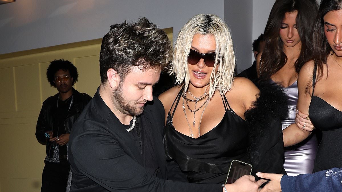 Bebe Rexha wears sunglasses as she is given a helping hand by friends while leaving Grammys bash