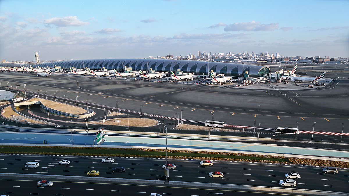 Airline worker who shared photos of Dubai bomb damage on his private WhatsApp is lured to meeting and arrested by authorities after they secretly snooped through his messages