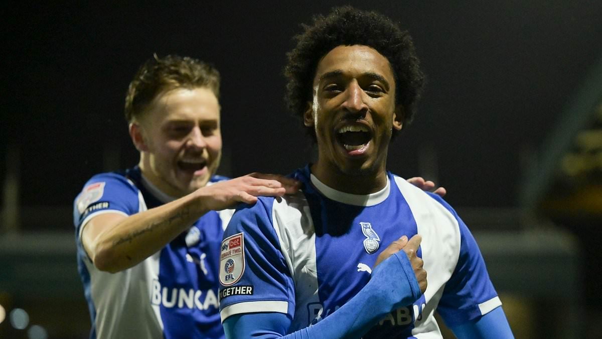 'The place is like a big family. Everyone's in it together': Inside Oldham's promotion push - why fans are flocking to games, sponsors are quitting Man United to join the party and how the club is 'reborn' under the Rothwells, writes super-fan MIKE KEEGAN