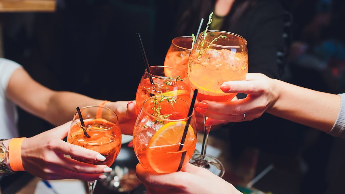 Forget coffee and red wine! Scientist reveals the surprising drinks that can stain your teeth - and it's bad news if you like Aperol Spritz