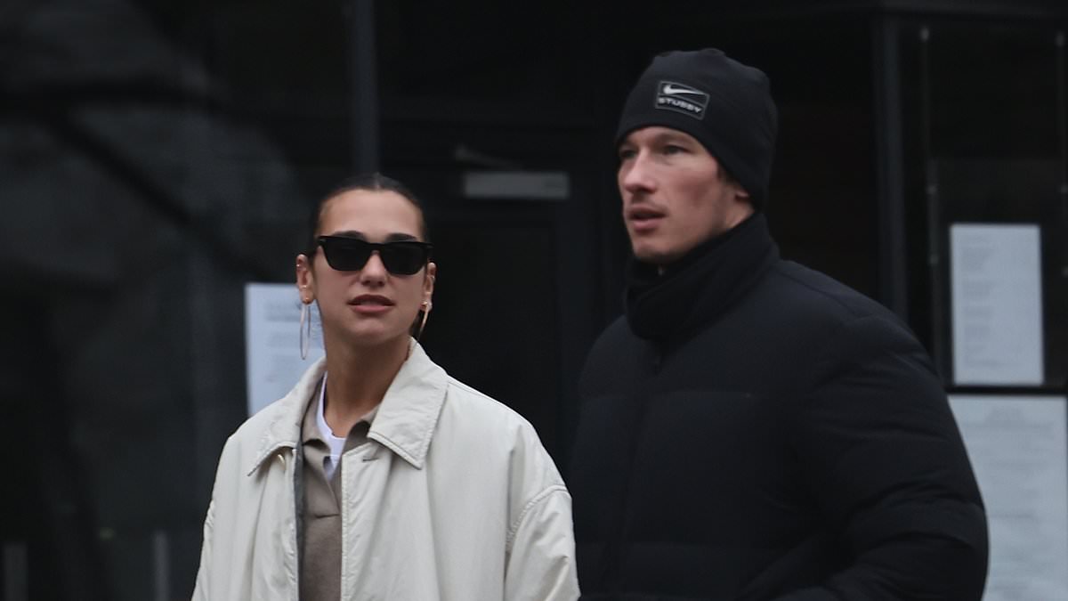 Bond favourite Callum Turner steps out on a low-key dog walk with fiancée Dua Lipa as it's claimed the 007 job is his and SHE's tipped to write the theme tune