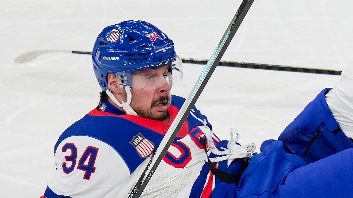Embarrassing moment USA hockey stars crash into each other at the Winter Olympics... before having tense exchange on the bench