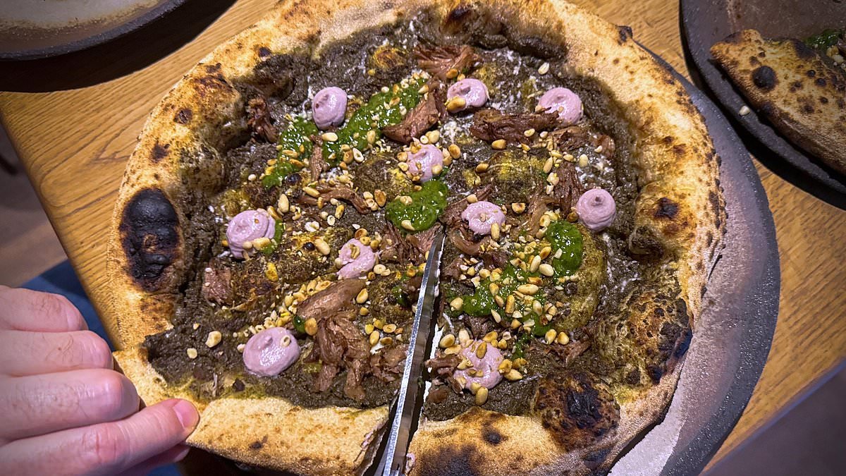 Pizza inspired by the ancient Romans features stomach-churning toppings including fermented spinach juice and fish sauce - and there's no mozzarella or tomato in sight