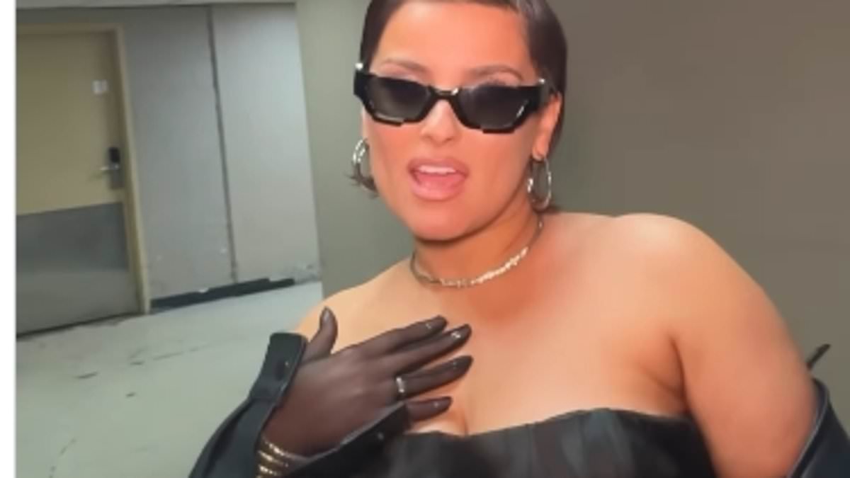 Nelly Furtado showcases her gorgeous curves in a strapless leather dress for sassy clip to promote her new single after quitting performing amid cruel body shaming attacks