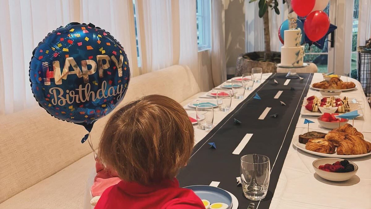 Robbie Williams and Ayda Field share rare family snaps as they celebrate son Beau's sixth birthday at the beach after buying a mansion in the Bahamas