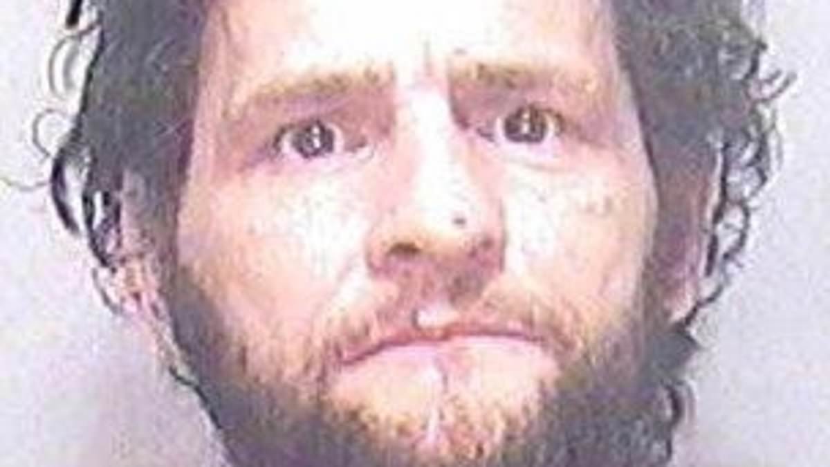 Killer, 52, is charged with attempted murder after rapist refugee attacked inside one of Britain's most notorious prisons