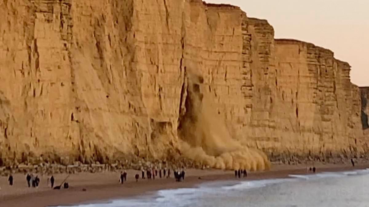 Dramatic moment cliff made famous in Broadchurch collapses with massive rockfall just metres from walkers