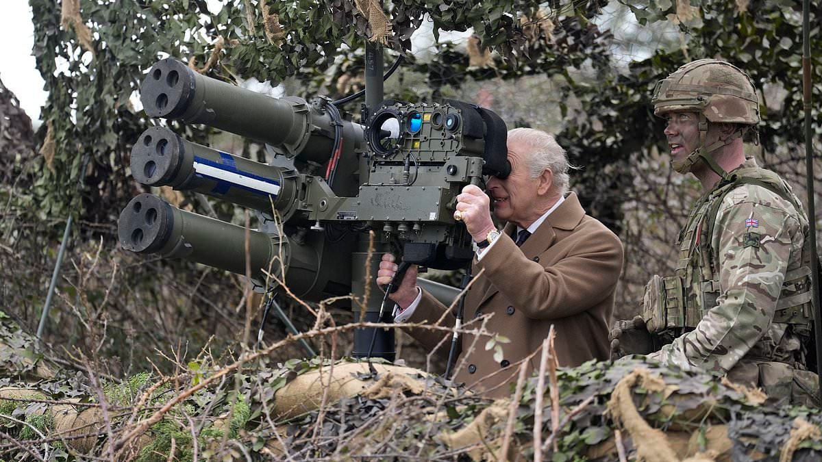 King Charles learns how to shoot down drones as he oversees troops rehearsing defending themselves from air attacks at Army base