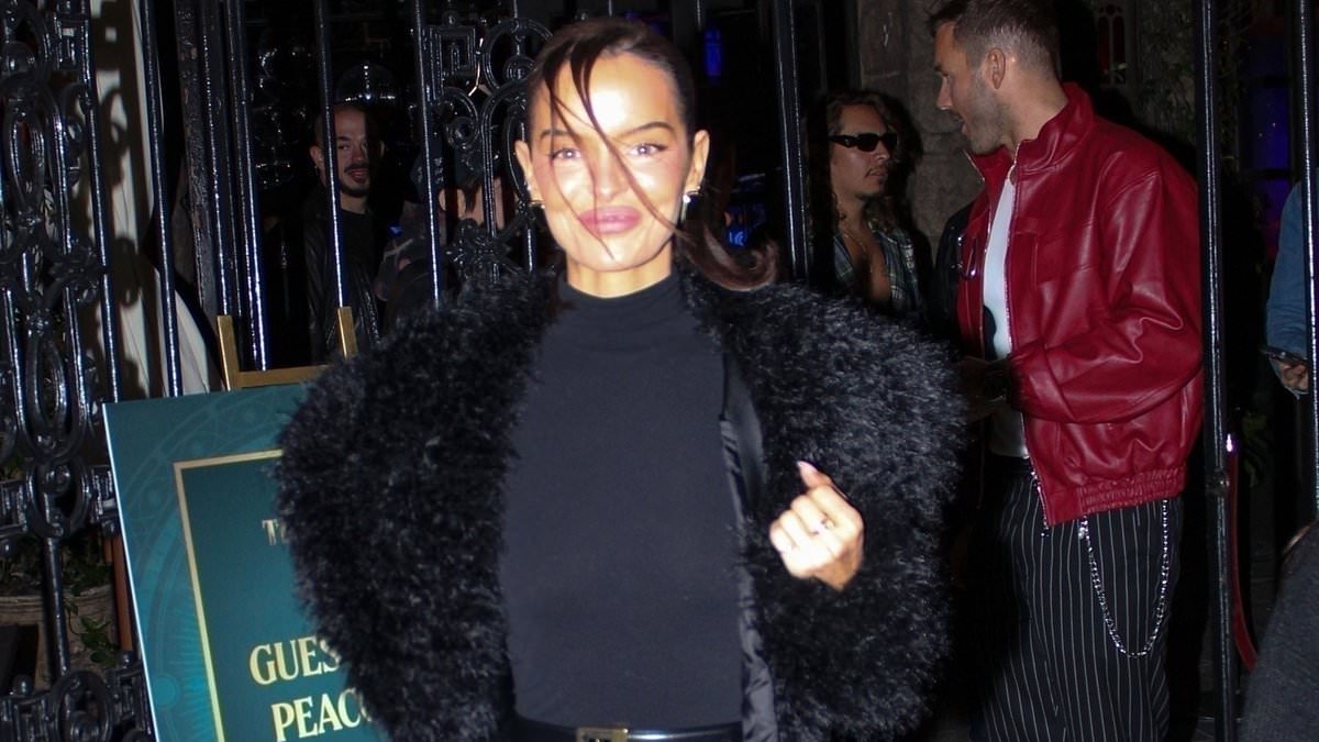 Traitors star Maura Higgins celebrates US fame with tights that say 'Mom, I am a rich man' at viewing party - after revealing plans to crack America