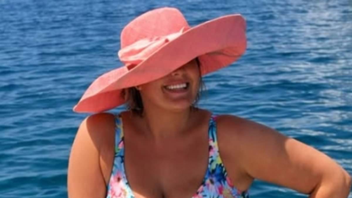 Gemma Collins, 44, looks incredible in a blue floral swimsuit as she shows off her amazing weight loss during a sun-soaked boat trip on holiday