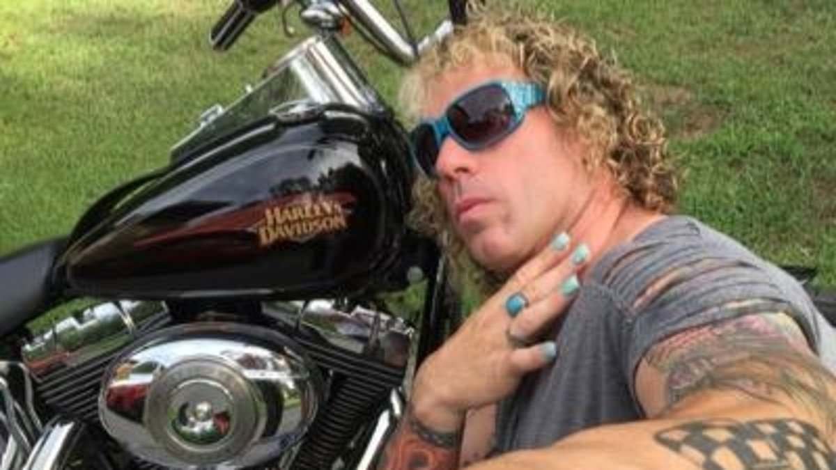 Chilling warning signs before gunman, who also used female name, killed two and critically injured three others at youth hockey game