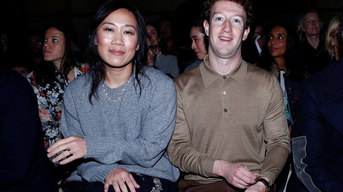 Mark Zuckerberg makes an awkward appearance on the front row with his wife Priscilla Chan at the Prada show during Milan Fashion Week
