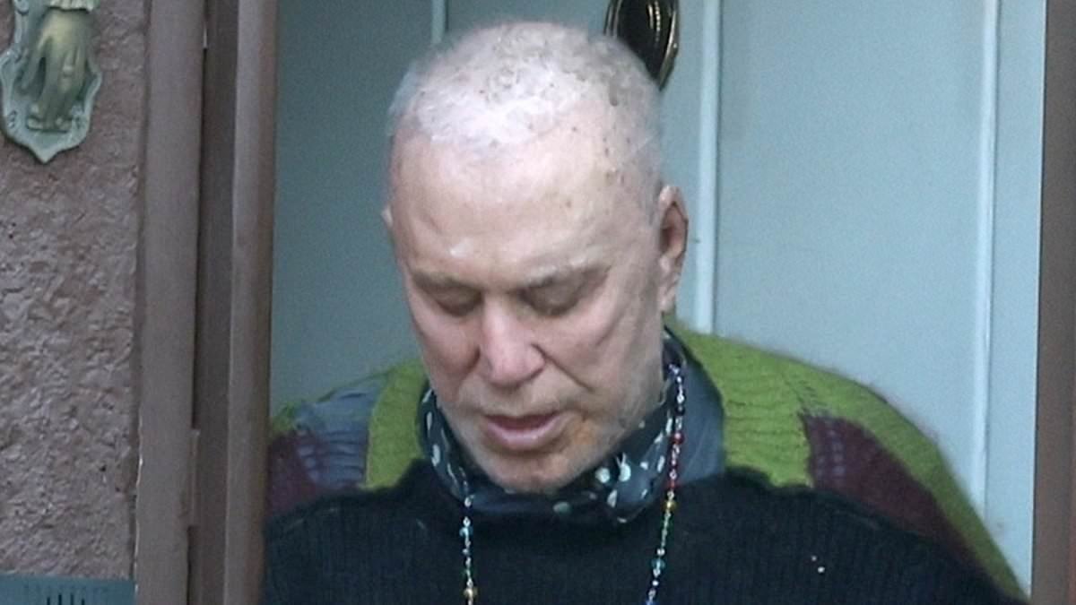 'He's living paycheck to paycheck - his hair is all gone': The harrowing photo that reveals Mickey Rourke's shocking decline - as insiders reveal his crippling cash crisis and eviction battle