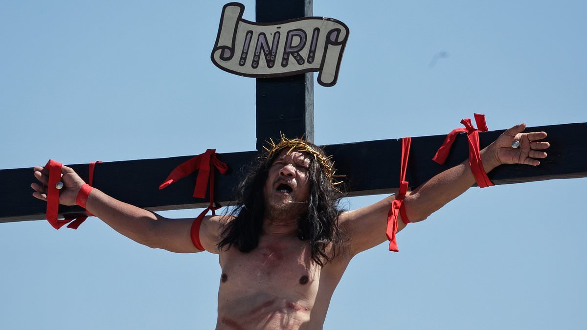 Catholic devotee is NAILED to a cross in brutal re-enactment of the crucifixion to mark Good Friday