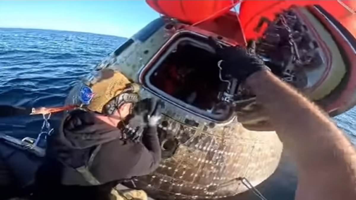 'Welcome home!' Watch the heartwarming moment the recovery crew opened Integrity's hatch after NASA's Artemis II astronauts splashed down following their historic moon mission