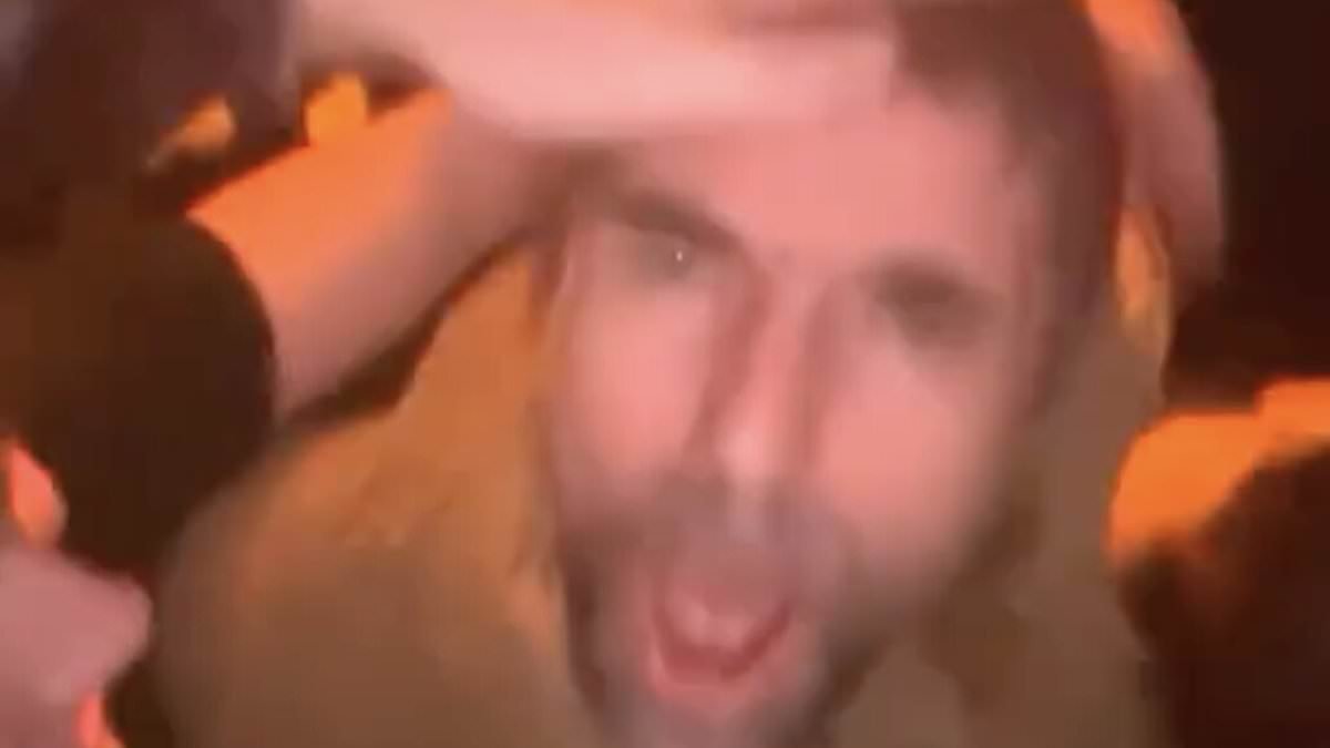 Liam Gallagher looks stunned after being swarmed by teenage fans while supporting son Gene at Miles Kane gig - before security escort them away