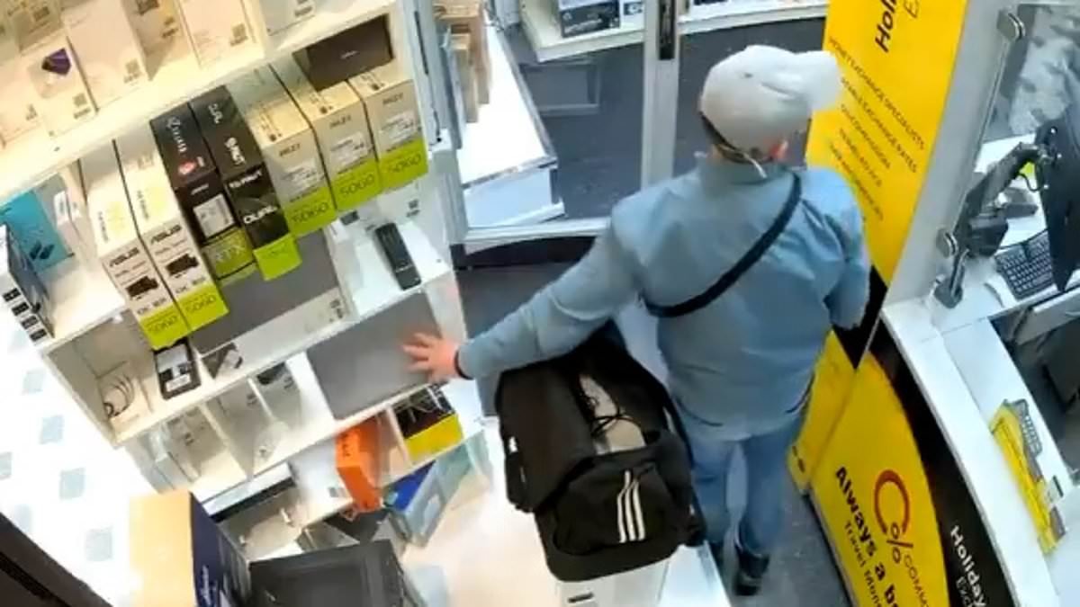 Moment brazen thief steals laptop in seconds as he distracts staff by trying to sell his old one