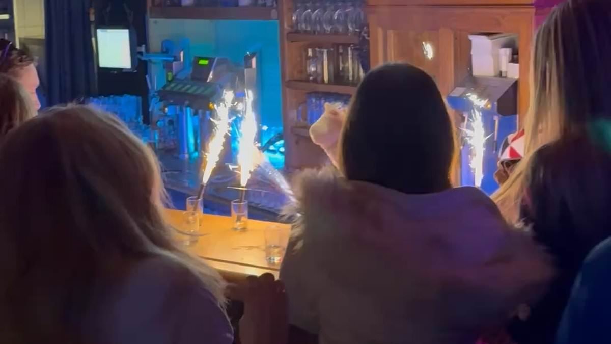 Disbelief after drinks sparklers that started Swiss ski resort fire that killed 40 were seen STILL being used a day later in wooden bar across the border