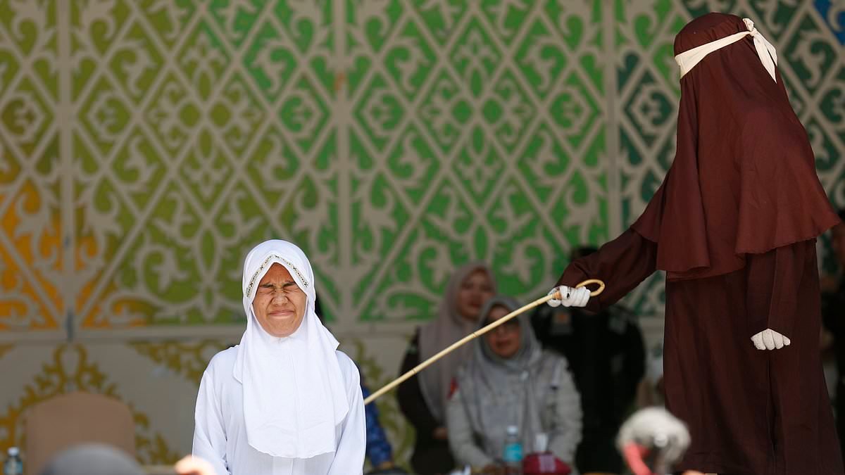 'One of the most severe' Sharia law canings carried out in Islamic Indonesian region sees woman collapse after she is lashed 140 times for having sex outside marriage