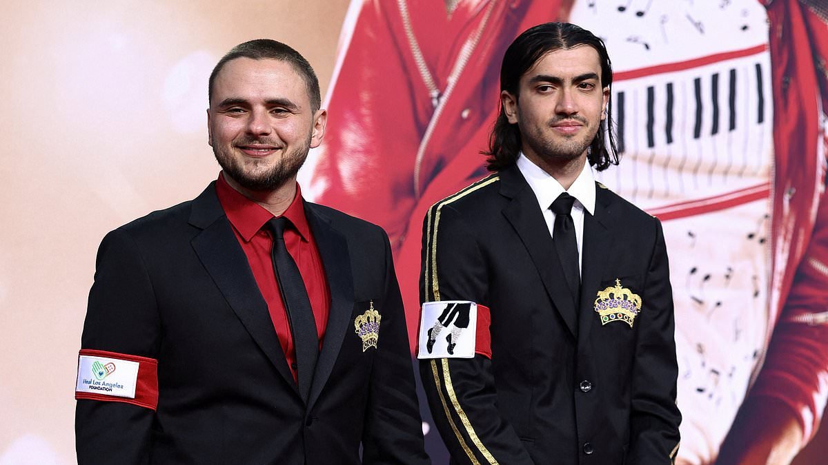 Blanket and Prince Jackson make rare appearance at Michael premiere... but Paris is a no-show