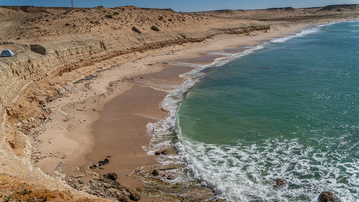 British girl, seven, missing after being swept out to sea while sitting on rocks with her family in Morocco