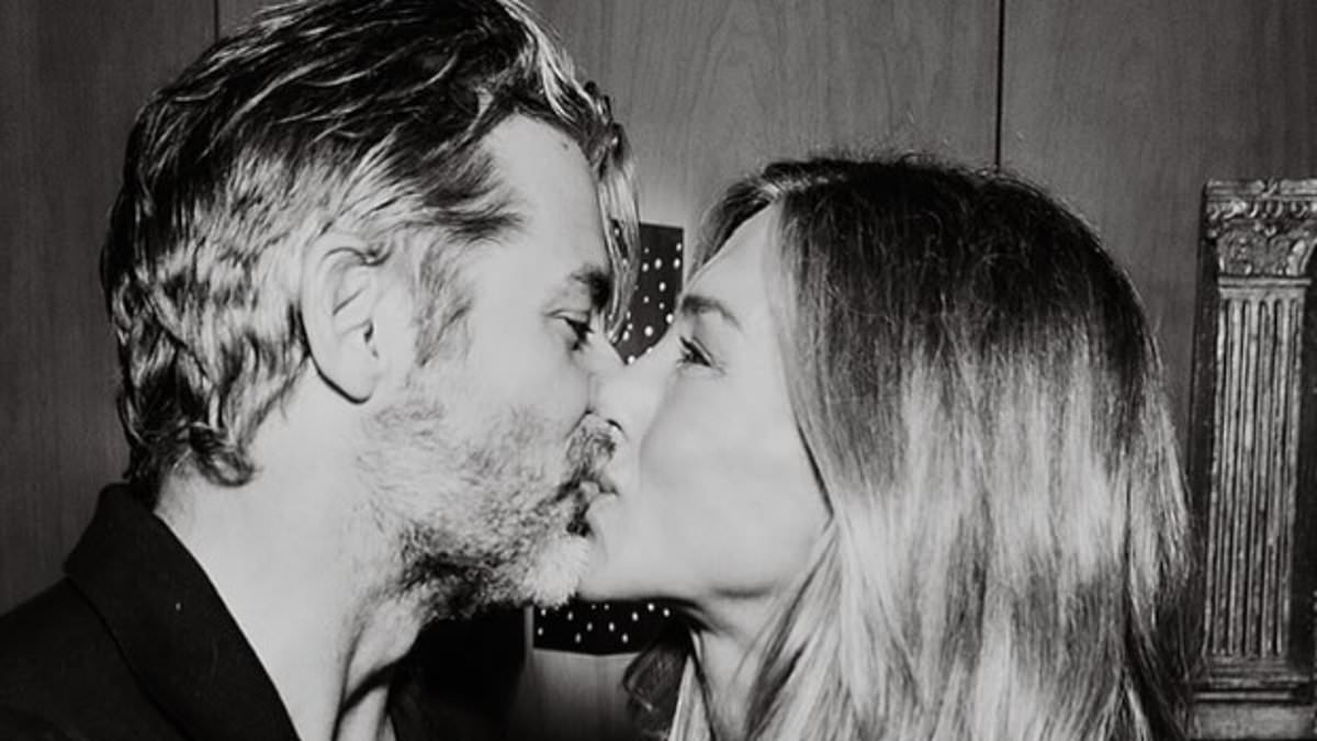 Jennifer Aniston kisses 'love guru' boyfriend Jim Curtis in intimate snap while celebrating her 57th birthday