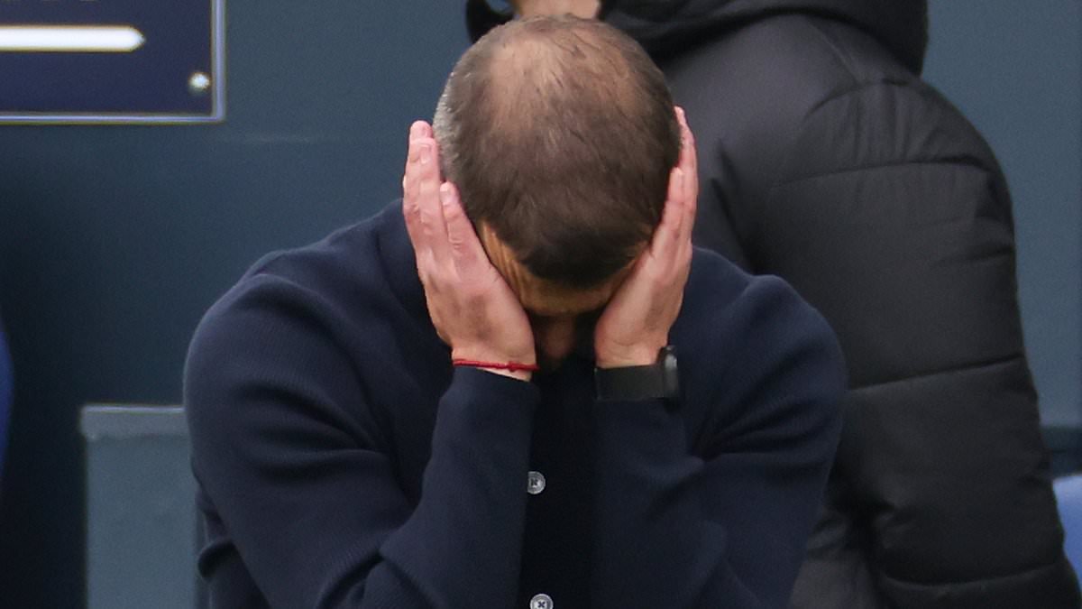 Jack Wilshere is DRAGGED away by his Luton players as angry ex-Arsenal star confronts Hatters fans after they chant his side are 'embarrassing' after dropping points in promotion race