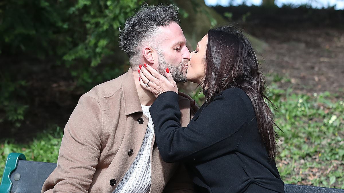 Kym Marsh and her new fiancé Tom Dickinson pack on the PDA as they share a kiss during romantic stroll