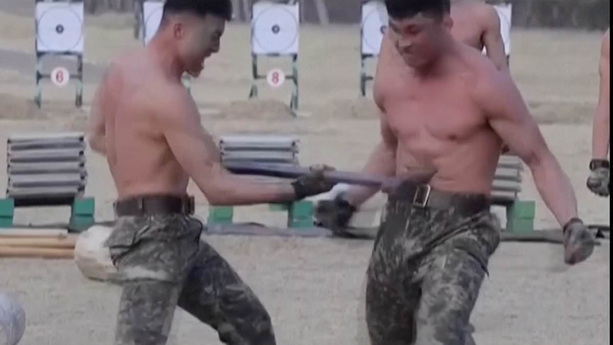 Moment Kim Jong Un watches on with a smile as troops break bricks with their heads and are hit in the stomach with spades and mallets