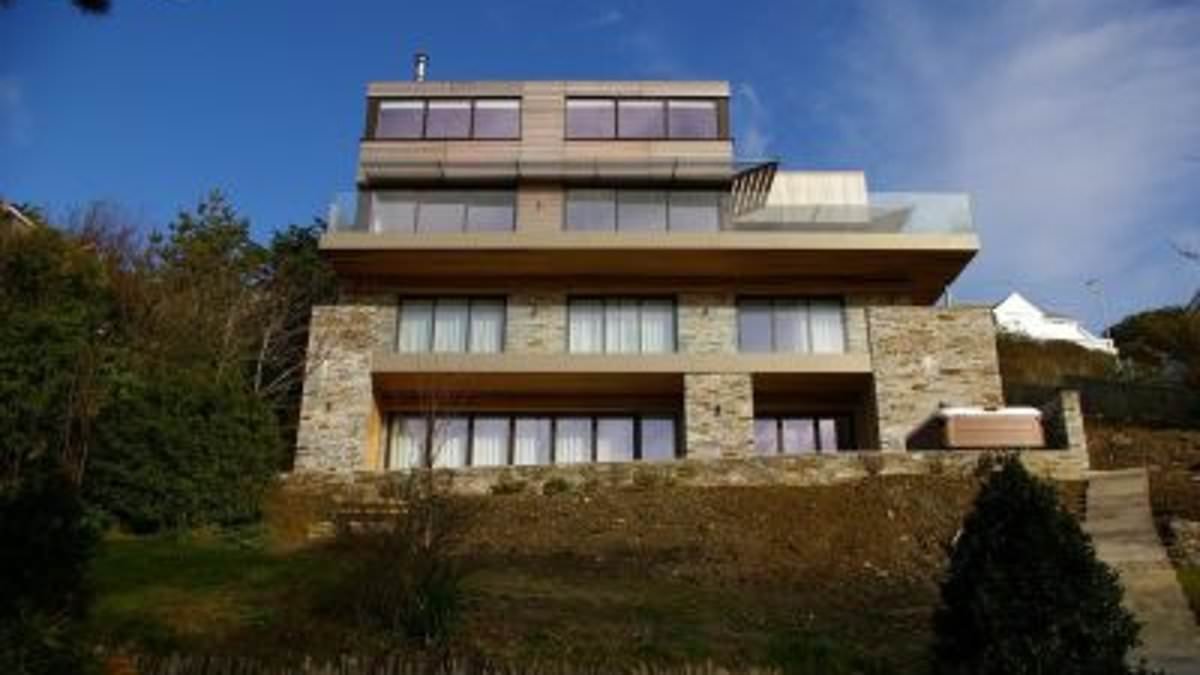 Meet the millionaire Cornish dentists 'laughing all the way to the bank' after Omaze paid them £4.4m to raffle off their home - nearly TWICE its market value